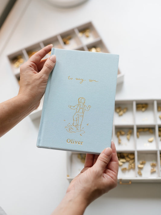 To My Son personalised baby journal in sky blue linen with gold foil illustrated cover