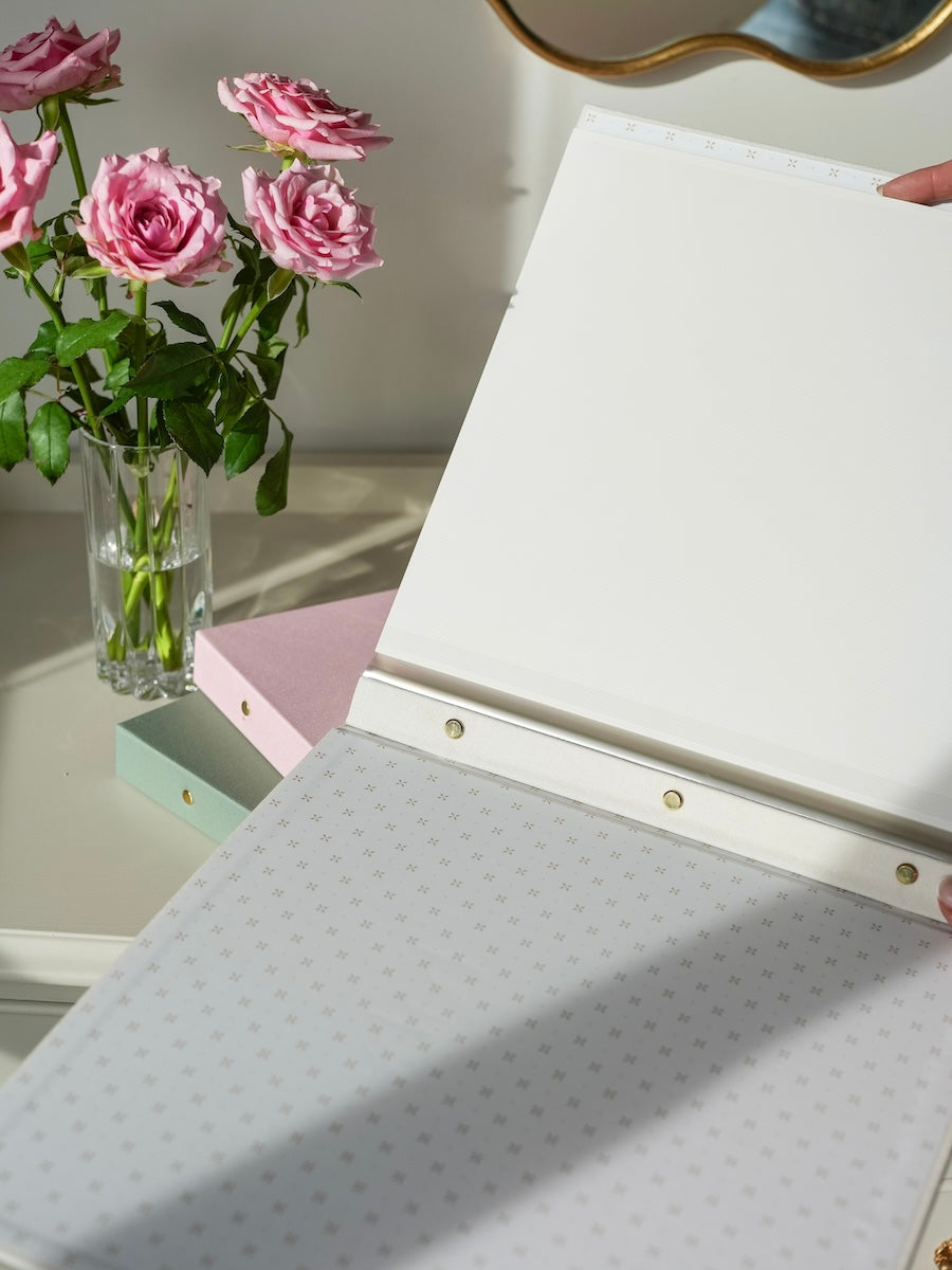 Inside the ivory Baby Photo Album