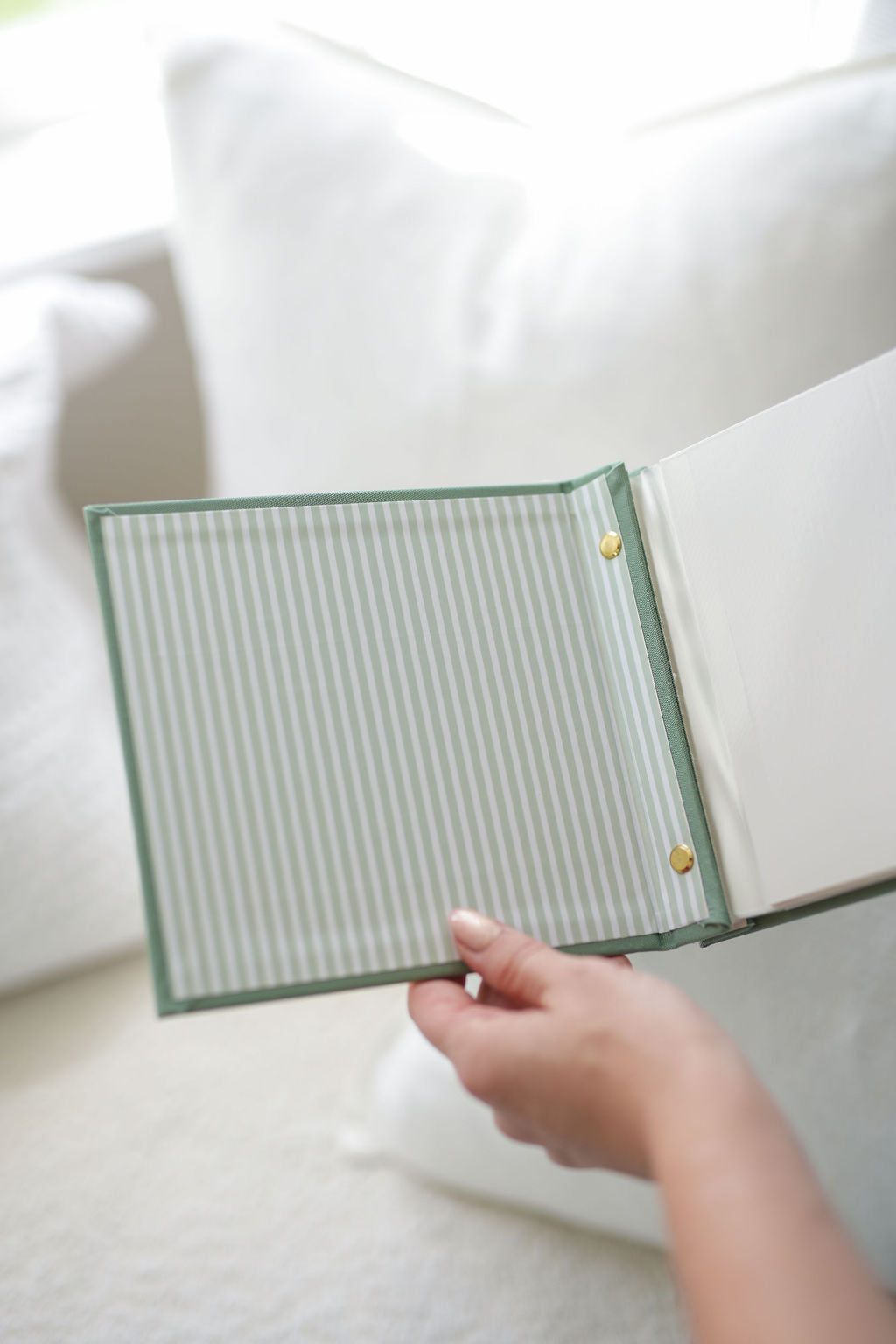 Inside the matcha green Travel Photo Album, self-adhesive pages